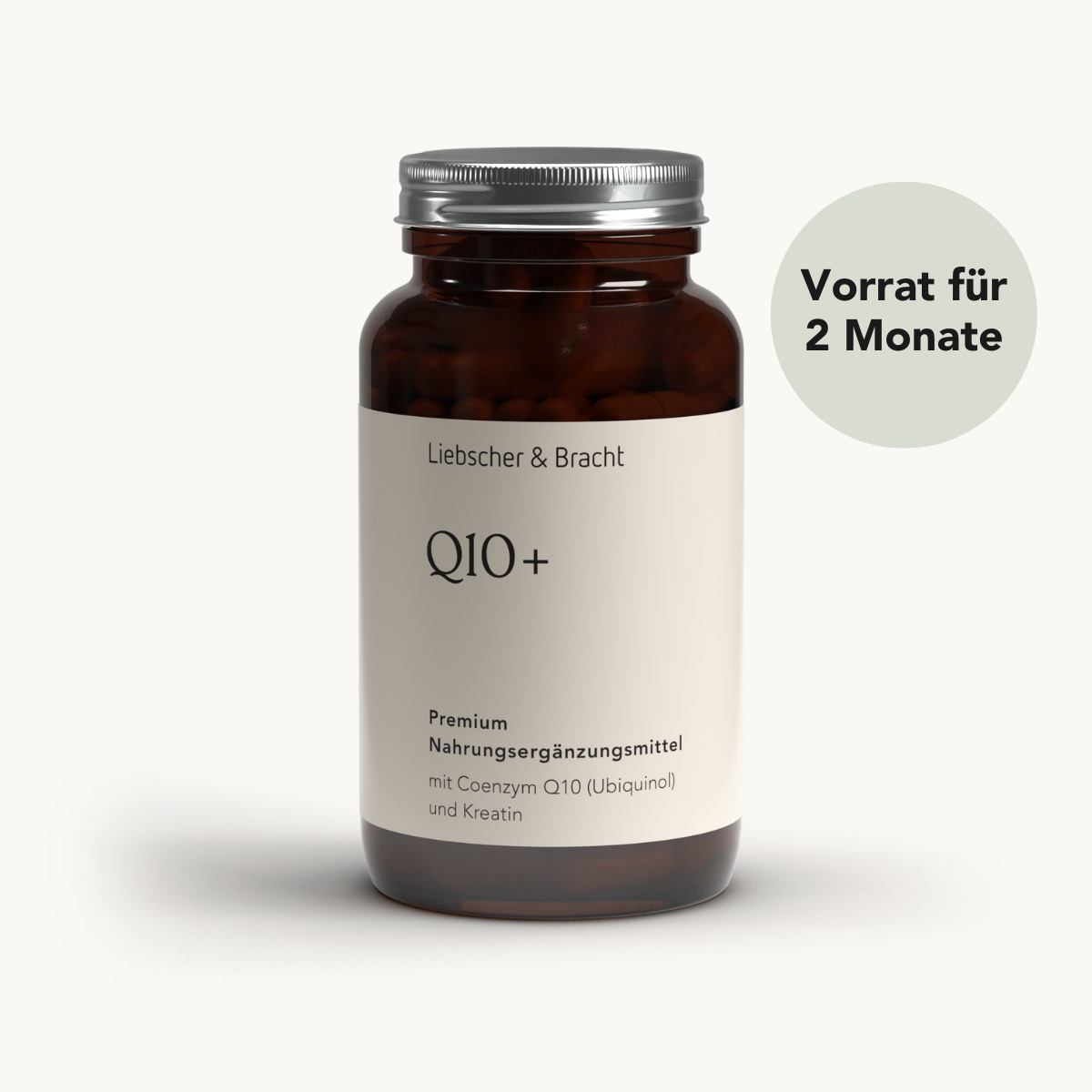 Eine braune Glasflasche mit der Aufschrift Q10+ für 2 Monate von Liebscher & Bracht, mit aktiviertem Ubiquinol für optimale Energieversorgung. Das runde Etikett zeigt einen Vorrat für zwei Monate.