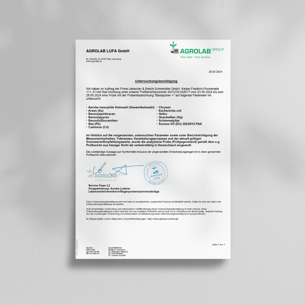 Ein gedruckter Briefbogen von Liebscher & Bracht zeigt auf einer hellgrauen Fläche das Produkt "ALL IN ONE - Basispulver", deutschen Text, Ankreuzfelder, Aufzählungszeichen zu Eisen und Vitamine, Unterschriften, Dienststempel und das Markenlogo oben rechts.