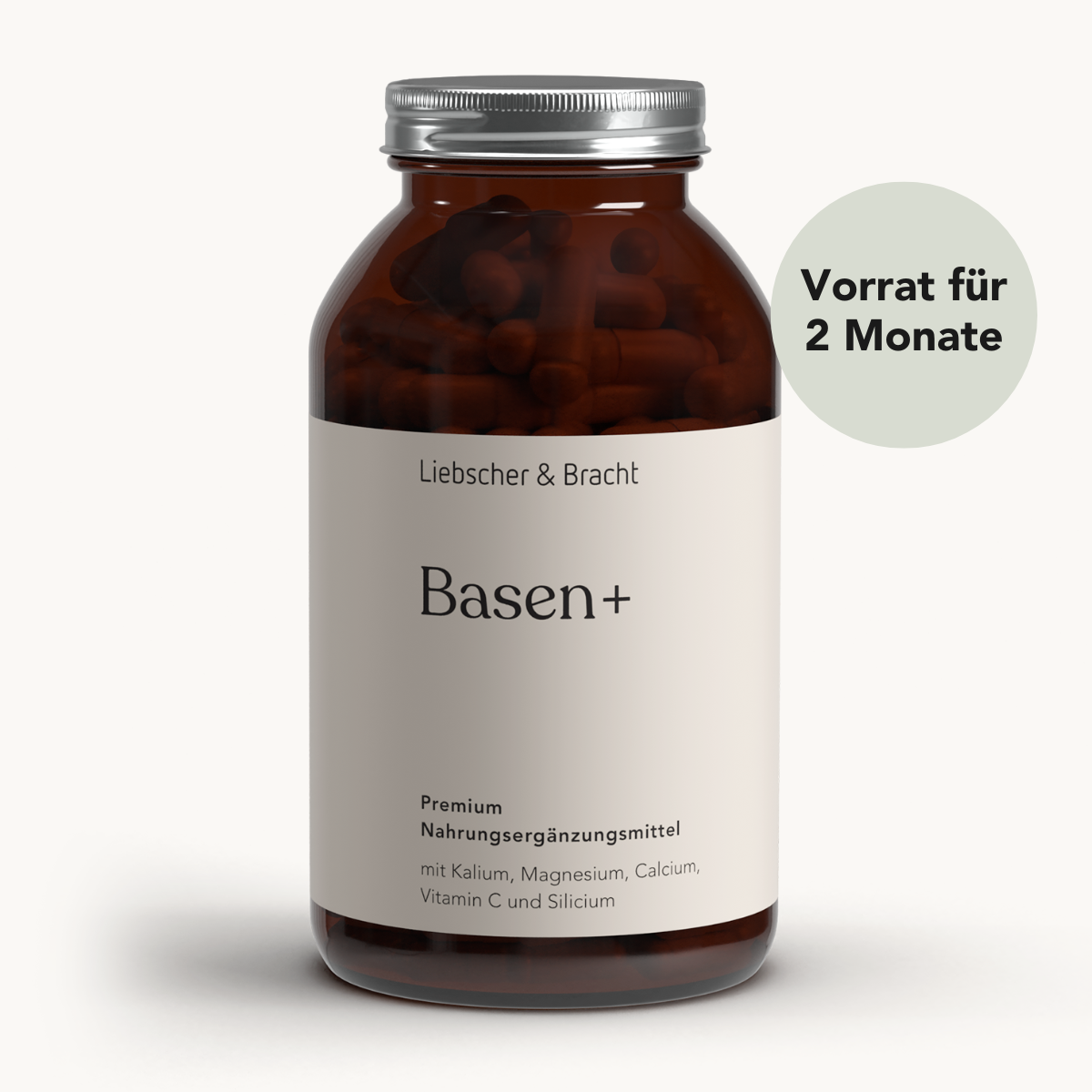Eine braune Flasche Basen+ für 2 Monate von Liebscher & Bracht, mit Magnesium Citrat und Kalium Citrat. Das runde Etikett weist auf einen zweimonatigen Vorrat an hochwertigen Nahrungsergänzungsmitteln hin.
