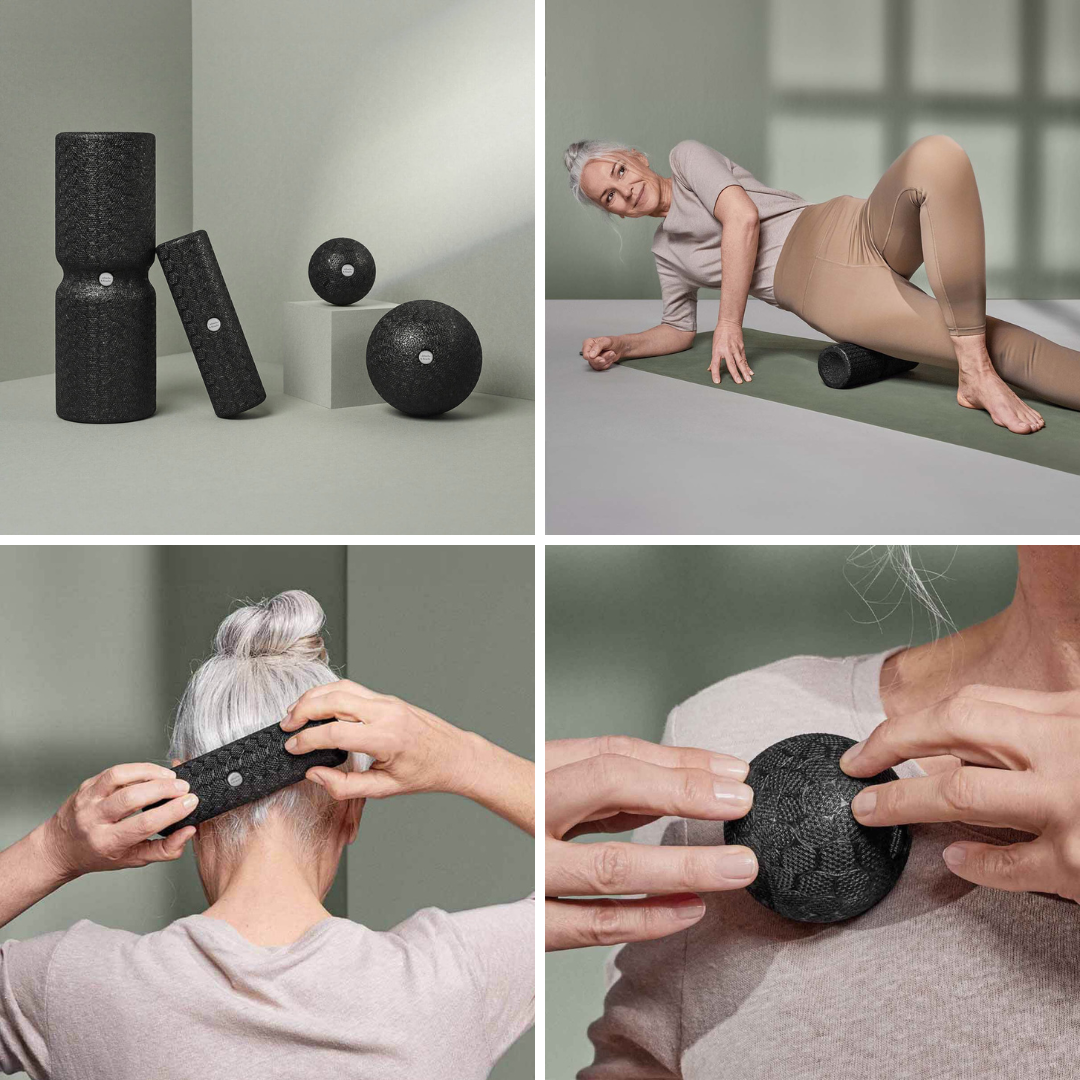 Eine Frau demonstriert die Anwendung der schwarzen Schaumstoffrollen und Massagebälle aus dem Dein ISG-Ischias-Paket von Liebscher & Bracht an ihrem Rücken und Nacken. Das Set bietet verschiedene Formen und Größen zur gezielten Muskelentspannung und -therapie.
