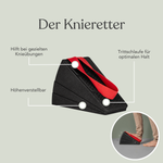 Das Liebscher & Bracht Dein Komplett-Paket zeigt eine schwarze, keilförmige Knietrainingshilfe mit rotem Griff, höhenverstellbarer, rutschfester Trittfläche und Unterstützung für gezielte Knieübungen. Der Ausschnitt zeigt die Nutzung mit einem Fuß.