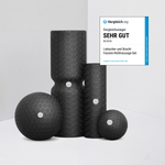 Das Faszien-Rollmassage-Set von Liebscher & Bracht in schwarzer Struktur-Optik ist vor einem weißen Hintergrund abgebildet. Ein blau-weißes 2025-Auszeichnungsetikett oben rechts bewertet es mit „Sehr Gut“ – ideal für Entspannung und mehr Beweglichkeit.