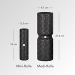 Abgebildet sind zwei schwarze Rollen aus dem Faszien-Rollmassage-Set von Liebscher & Bracht: die Mini-Rolle (18 × 5,3 cm) und die Medi-Rolle (27,8 × 9,7 cm, mit einer geformten Vertiefung) – ideal zur Entspannung und für mehr Beweglichkeit.