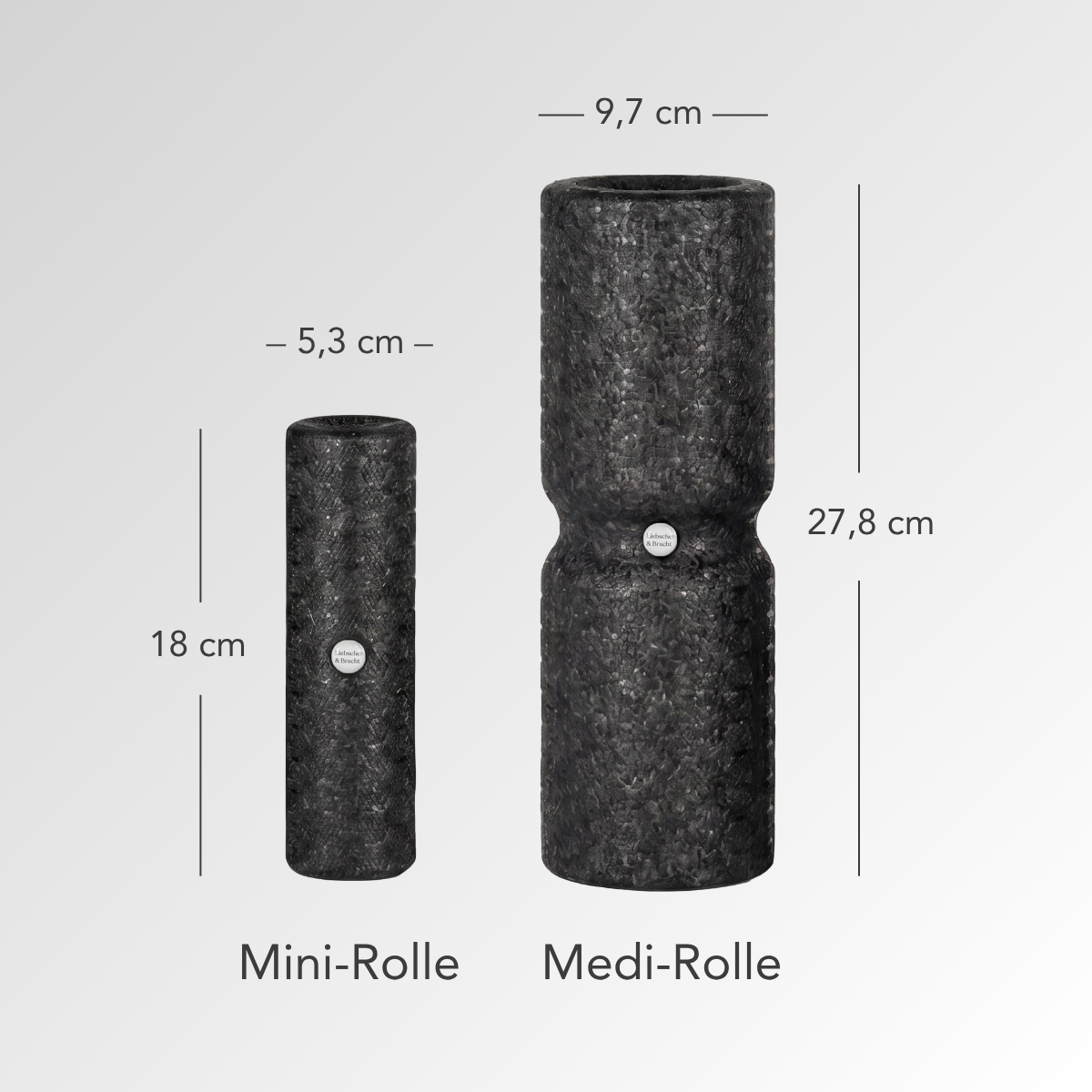 Abgebildet sind zwei schwarze Rollen aus dem Faszien-Rollmassage-Set von Liebscher & Bracht: die Mini-Rolle (18 × 5,3 cm) und die Medi-Rolle (27,8 × 9,7 cm, mit einer geformten Vertiefung) – ideal zur Entspannung und für mehr Beweglichkeit.