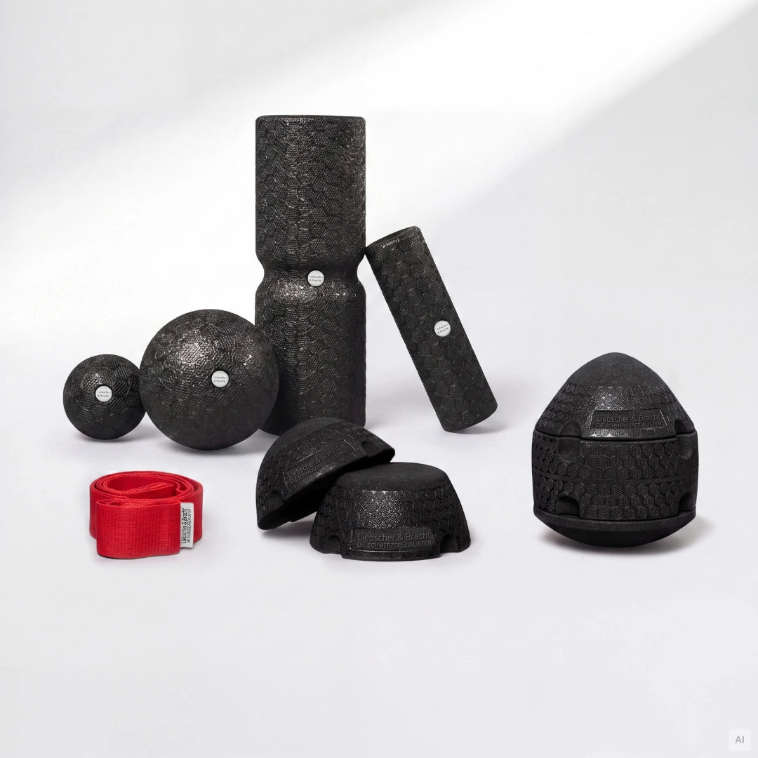 Dein ISG-Ischias-Paket enthält schwarze Massagehilfen aus Schaumstoff in verschiedenen Formen und Größen sowie ein rotes Stoffband, das als Trainingshilfe dient.
