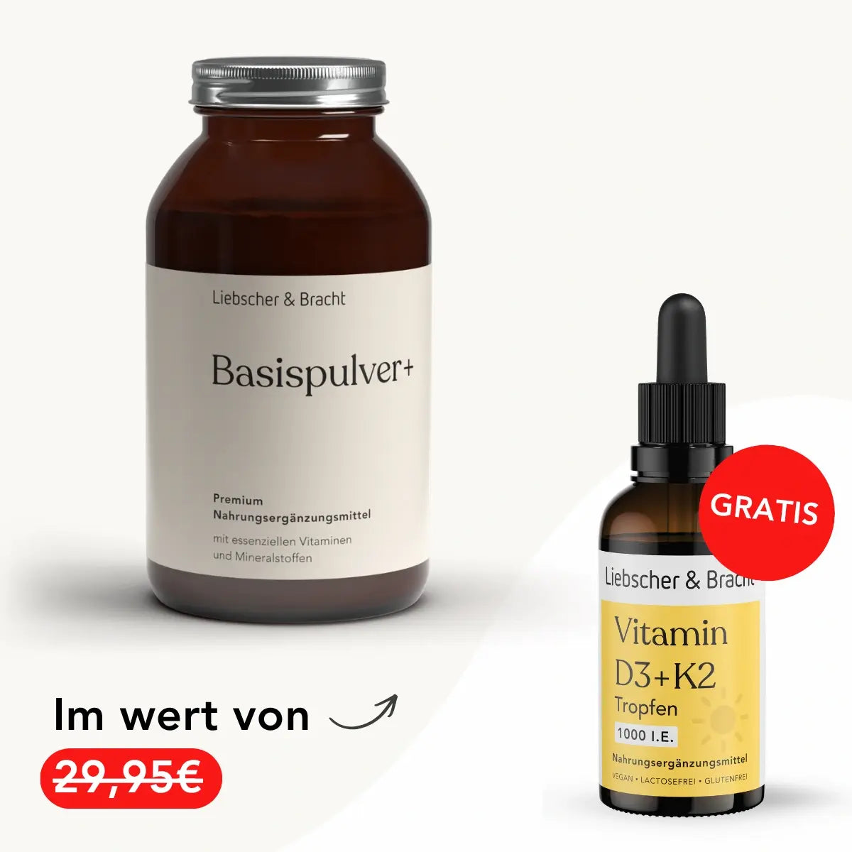 Neben einer Tropfflasche mit der Aufschrift „Vitamin D3+K2 Tropfen“ steht ein braunes Glas von Liebscher & Bracht mit der Aufschrift „ALL IN ONE – Basispulver“ – ideal für den täglichen Bedarf an Vitamin B12 und Eisen. Ein rotes „GRATIS“-Etikett hebt die Tropfflasche hervor, während der Text vor einem schlichten weißen Hintergrund einen reduzierten Preis von 29,95 € anzeigt.