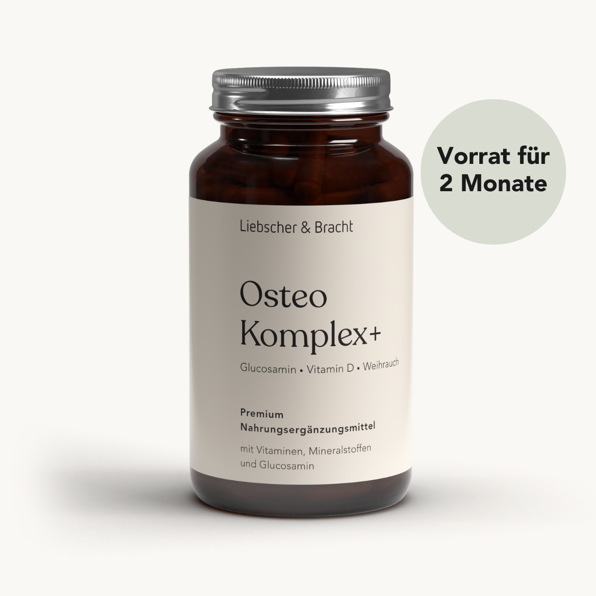 Eine braune Flasche mit der Aufschrift Osteo Komplex+ für 2 Monate von Liebscher & Bracht hat ein beiges Etikett und einen deutschen Text, der auf eine zweimonatige vegane Versorgung zur Unterstützung der Knochen hinweist.