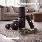 Dein Schulter-Paket mit Schaumstoff-Massagerollen, Faszienkugeln und einem Widerstandsband auf einem Wohnzimmerteppich, beschriftet mit Das Faszien-Rollmassage-Set und Der Schulterretter.