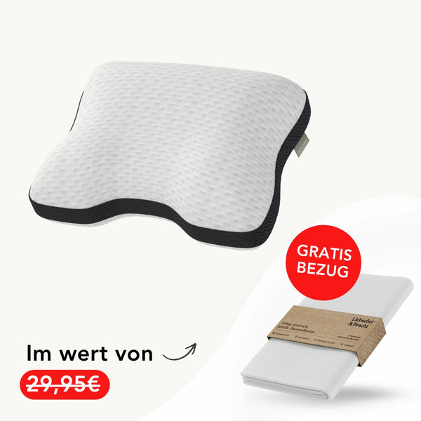 Das Liebscher & Bracht Kissen ist ein weißes, ergonomisches Kissen mit schwarzen Rändern, das besonders beim Liegen auf dem Rücken für bequemen Halt sorgt. Auf dem Bild oben ist ein gefalteter weißer Kissenbezug mit der Aufschrift „GRATIS BEZUG“ zu sehen; außerdem enthält das Set den Text „Im Wert von 29,95 €“, wobei der Preis rot durchgestrichen ist.
