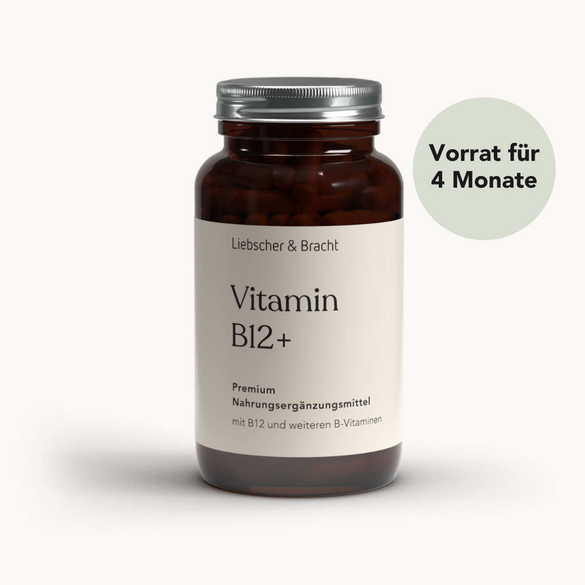 Eine braune Liebscher & Bracht Vitamin B12+ für 4 Monate Flasche mit silbernem Deckel auf weißem Hintergrund; in einem grünen Kreis steht "Vorrat für 4 Monate". Enthält wichtige B-Vitamine, ist vegan und unterstützt dein Immunsystem.